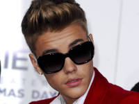 Justin Bieber apologizes for visiting...